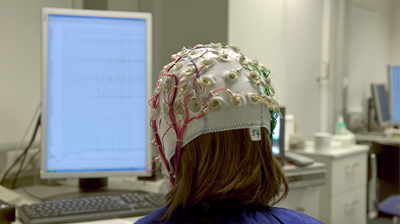 Person in Electroencephalography Cap