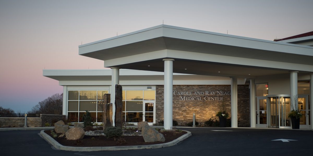 Exterior of the Neag Medical Center at Caron's campus in Wernersville, PA, at sunset.