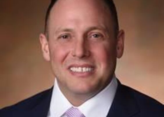 A headshot of Kenneth Lanning.