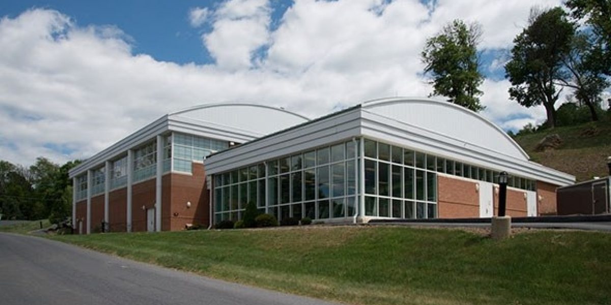 Photo showing the outside of Levin gym on a nice day