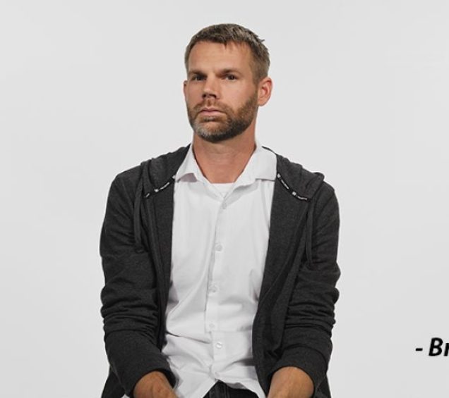 Photo of Caron alumnus Brian against a light background.